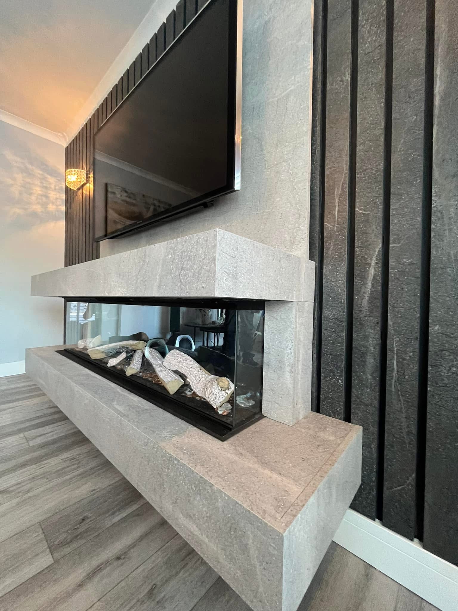 Stone fireplace media wall with vertical slats